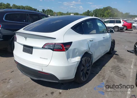 2025 Tesla Model Y Performance Dual Motor All-Wheel Drive z USA, uszkodzony, nr VIN 7SAYGDEF2SF298271